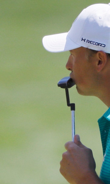 The Latest: Fast start puts Lowry up there with Spieth, Day